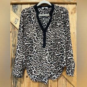 Leopard and black work top. Size medium.